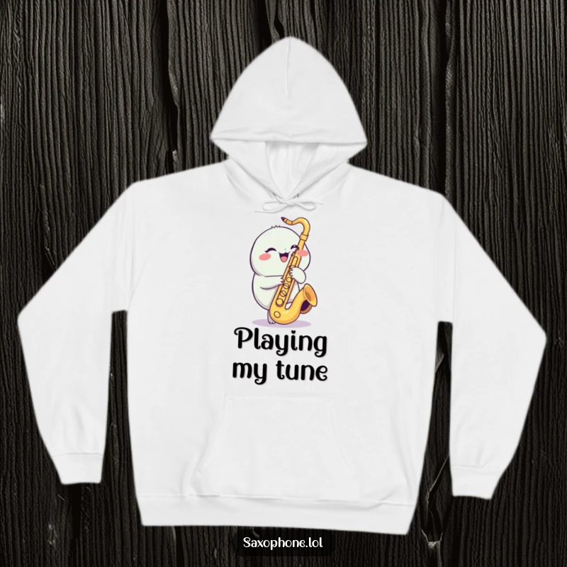 Funny Saxophone Hoodie: A round, cheerful creature giggling while playfully tapping saxophone valves, for cozy music vibes.
